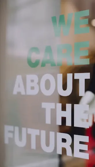 Window lettering reading: We care about the future